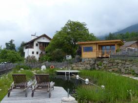 Saunahütte mit Badeteich